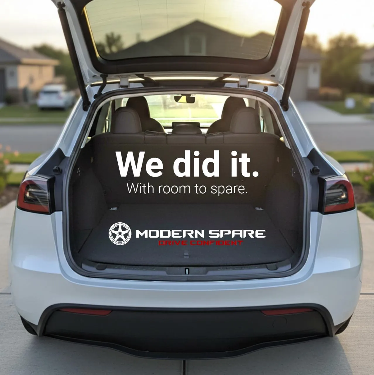 sub trunk ad Model Y w/ spare stored under cargo floor